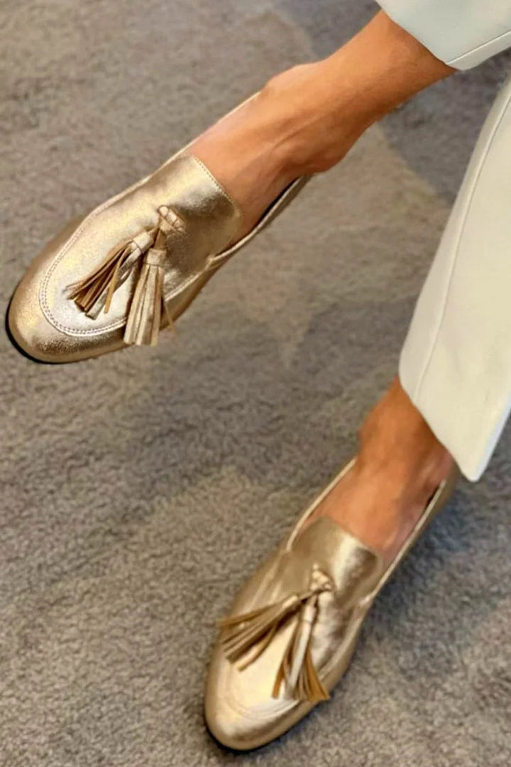 Tassel-Embellished Gold Moccasins