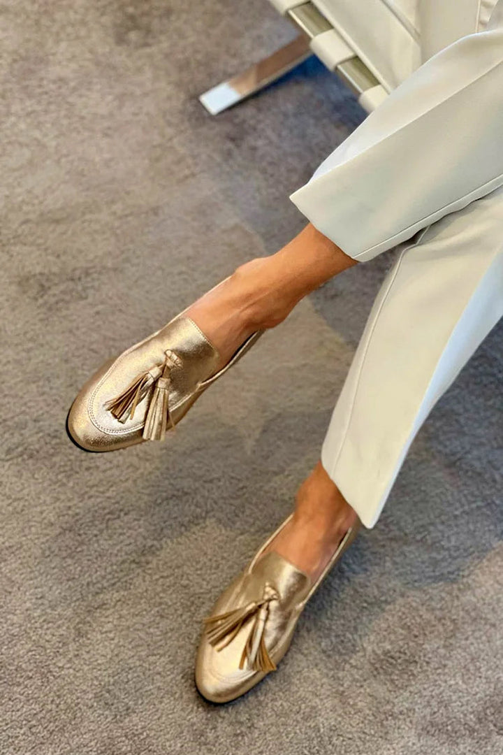 Tassel-Embellished Gold Moccasins